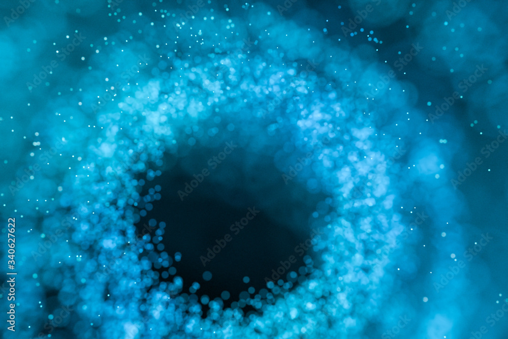 black hole with blue shiny particles, 3d rendering. black hole with blue shiny particles, 3d rendering.