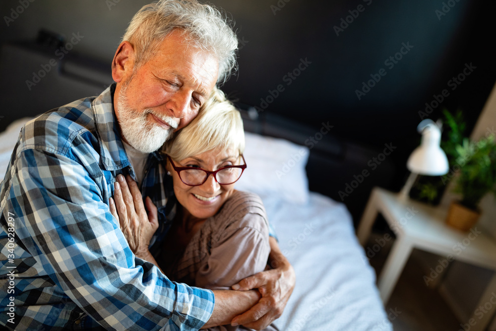 Cheerful senior couple enjoying life and spending time together Cheerful senior couple enjoying life and spending time together