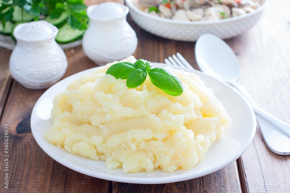 mashed potatoes on a white plate, selective focus mashed potatoes on a white plate, selective focus