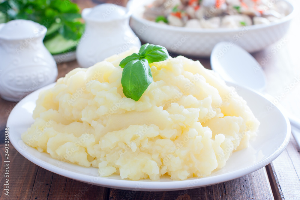 mashed potatoes on a white plate, selective focus mashed potatoes on a white plate, selective focus