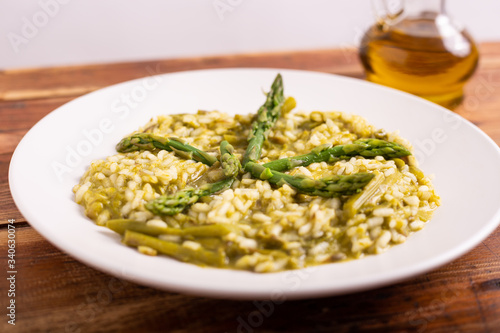 Risotto with asparagus. Typical dish of the Italian tradition, healthy and light. Ideal for a summer lunch