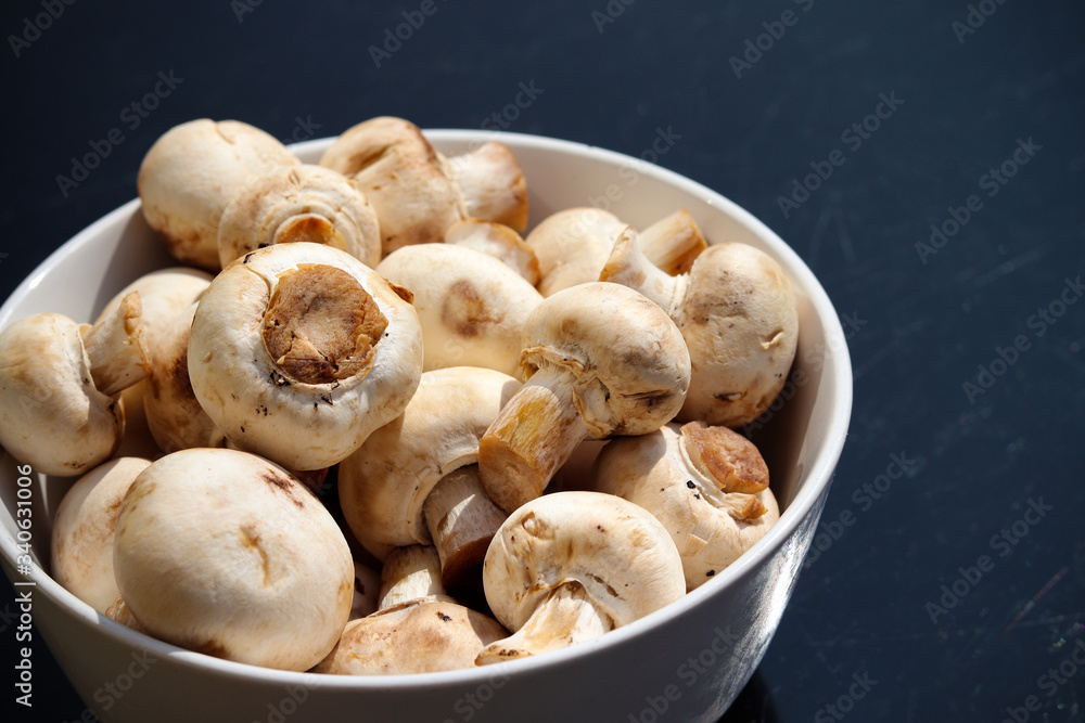 A pile of fresh mushrooms A pile of fresh mushrooms
