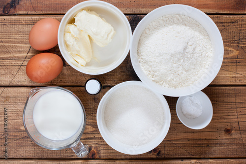 Step-by-step preparation of vanilla muffins, step 1 - preparation of ingredients, top view, horizontal