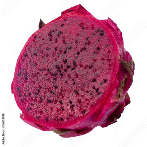 Red dragon fruit in a cut. Isolated on a white background.