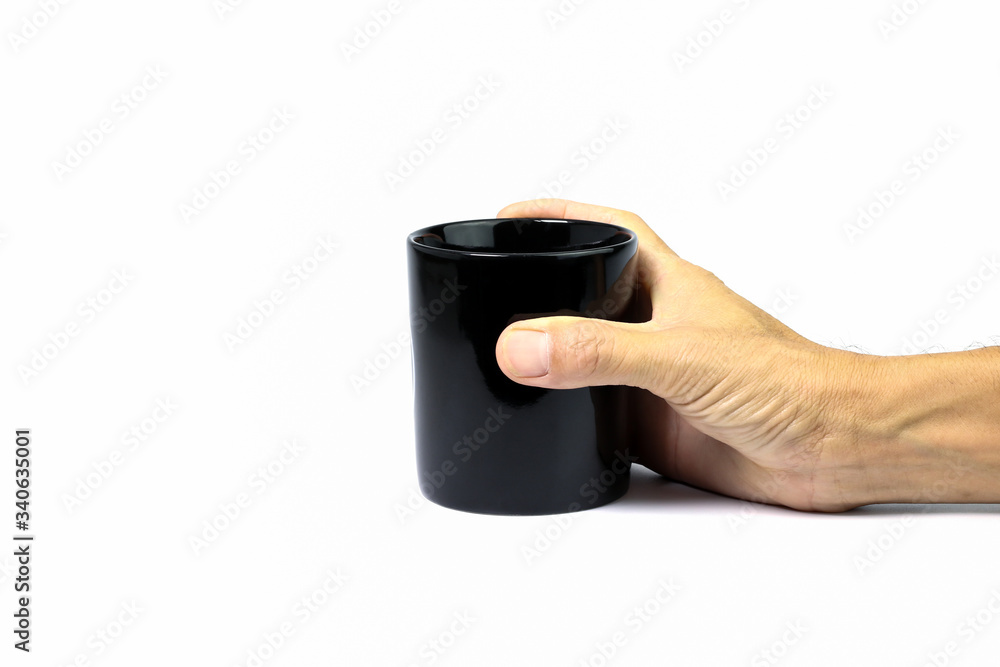 Hand holding black coffee cup on white background Hand holding black coffee cup on white background