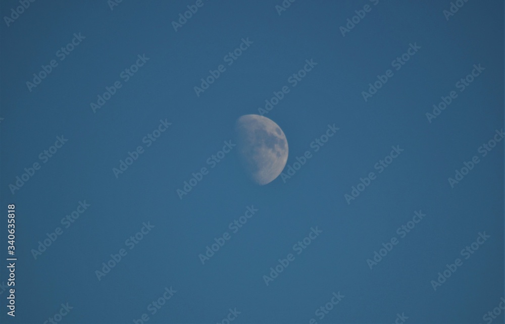 blue sky with cloud and moon in summer or plane blue sky with cloud and moon in summer or plane