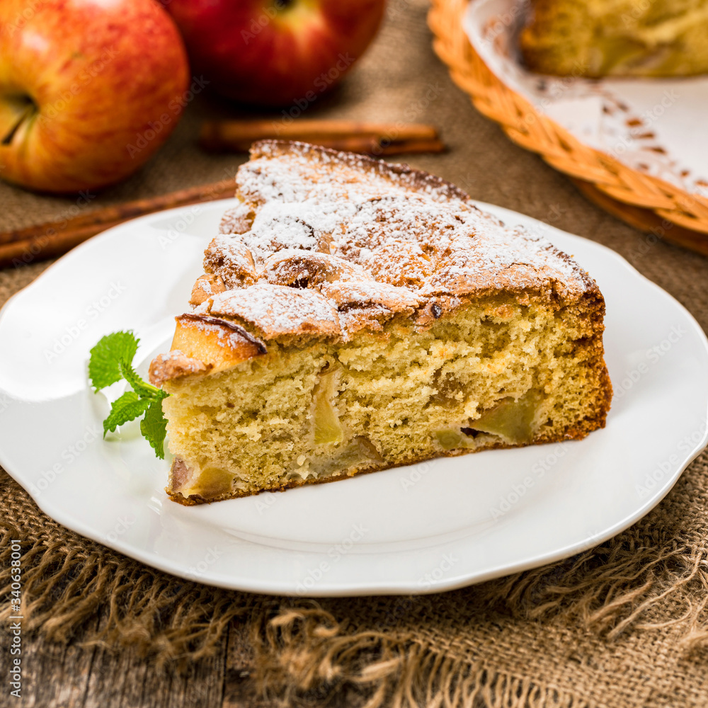 Apple Cake with Chunks of Sweet Apples. Selective focus. Apple Cake with Chunks of Sweet Apples. Selective focus.