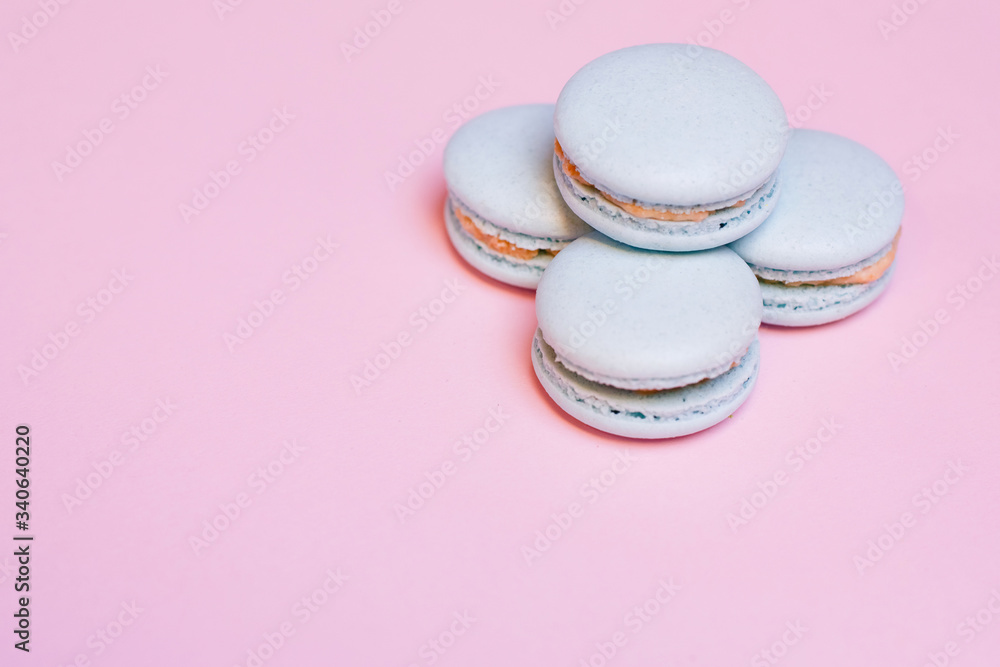 top view of tasty pink macaroons Colorful macaroni cookies, macaroni cake or macaroni cookies on a pink background. Space for text top view of tasty pink macaroons Colorful macaroni cookies, macaroni cake or macaroni cookies on a pink background. Space for text