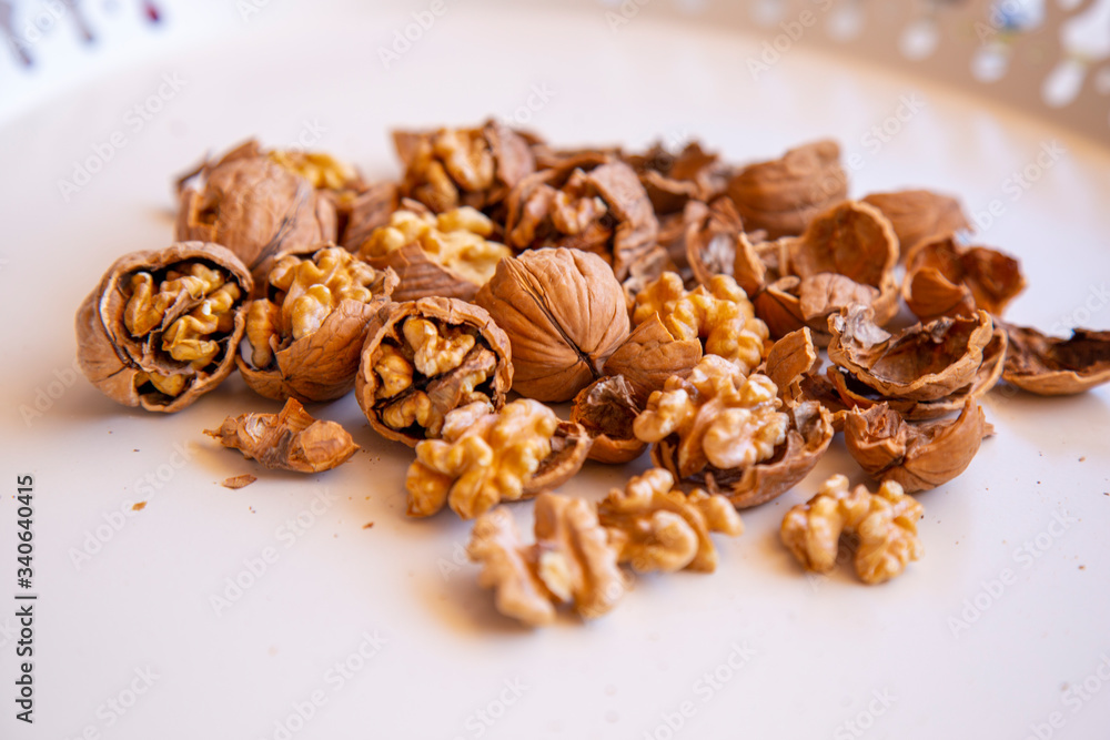 pilled walnut isolated on white background. Composition from nuts on the white isolated background pilled walnut isolated on white background. Composition from nuts on the white isolated background