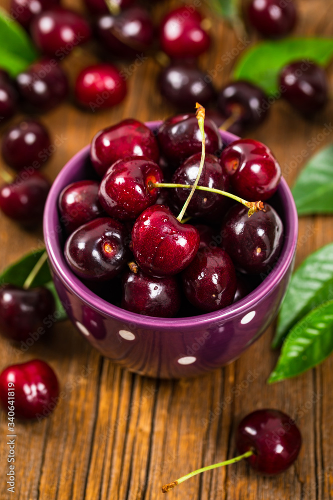 Cherry on Wooden Background. Selective focus. Cherry on Wooden Background. Selective focus.