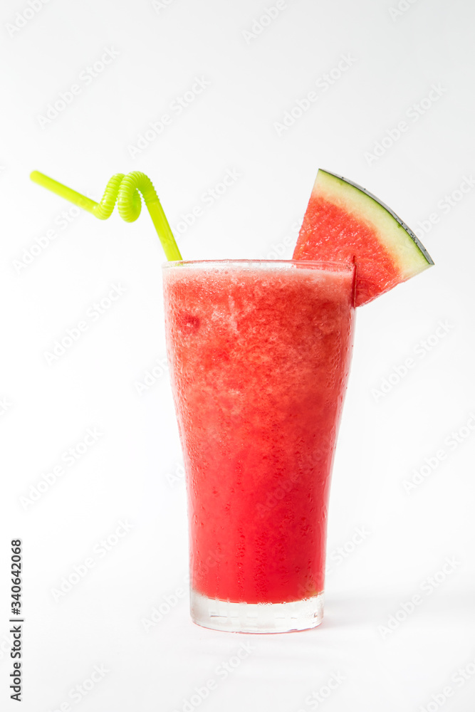 red watermelon smoothie in a tall glass decorated with a piece of watermelon red watermelon smoothie in a tall glass decorated with a piece of watermelon