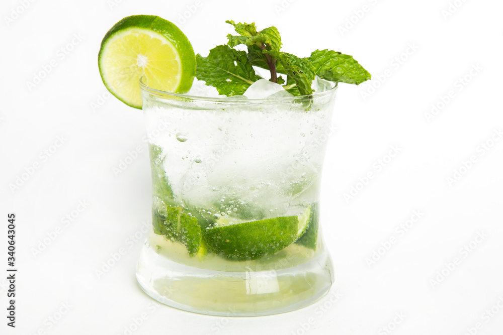mojito cocktail lime juice with soda and water served in a glass decorated with sliced lime and mint leaves mojito cocktail lime juice with soda and water served in a glass decorated with sliced lime and mint leaves