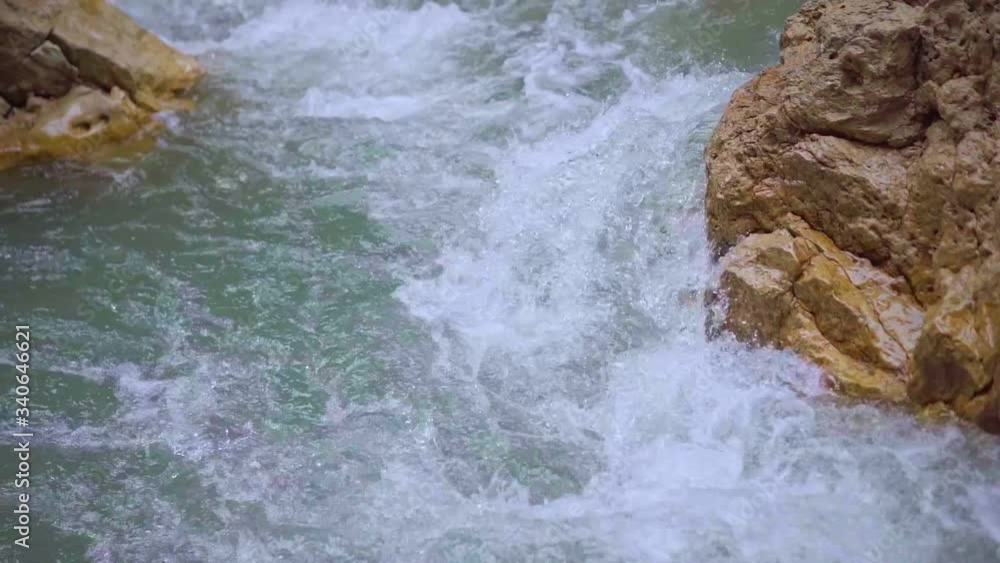 The rapid course of the mountain clean river The rapid course of the mountain clean river