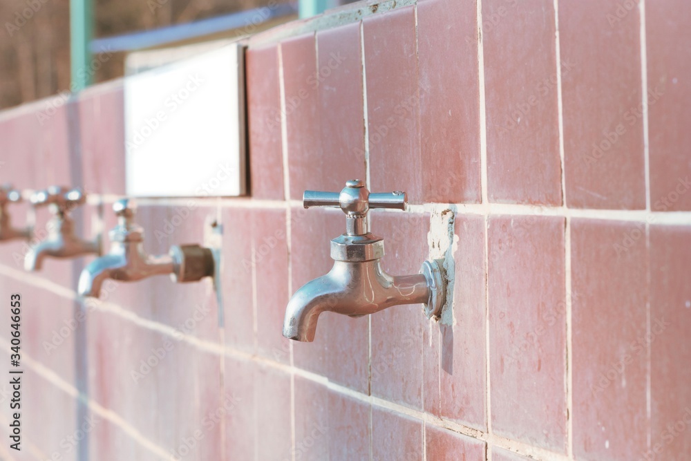 custom made wallpaper toronto digitalPublic outdoor faucets at camp site. Closeup shot.