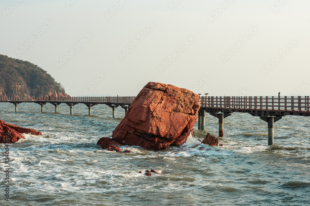 custom made wallpaper toronto digitalWestbound rocky shore of with red rocks during high tide. Late afternoon view.
