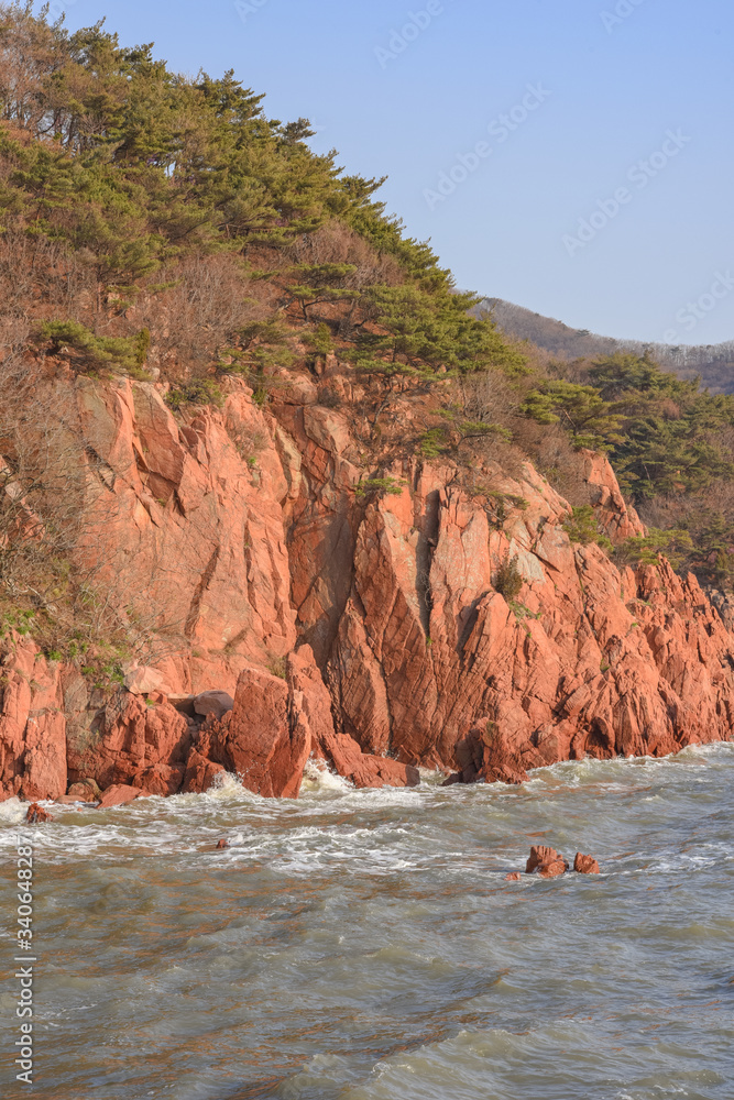 custom made wallpaper toronto digitalWestbound rocky shore of with red rocks during high tide. Late afternoon view.