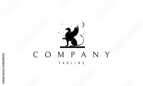 Vector logo on which an abstract image of a griffin sitting on a plate under the moon and stars.
