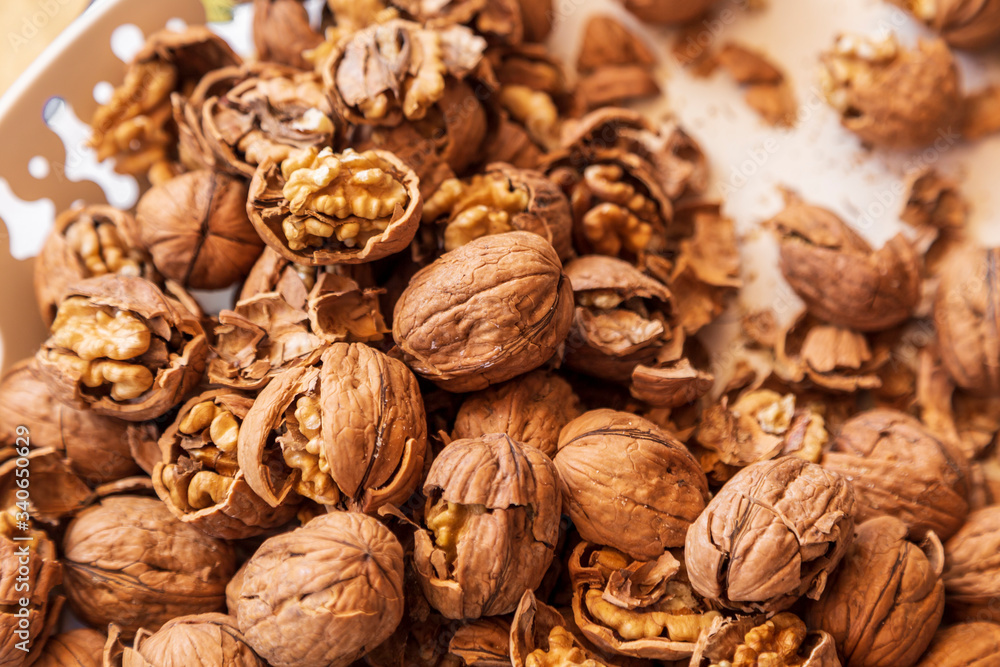 pilled walnut isolated on white background. Composition from nuts on the white isolated background pilled walnut isolated on white background. Composition from nuts on the white isolated background