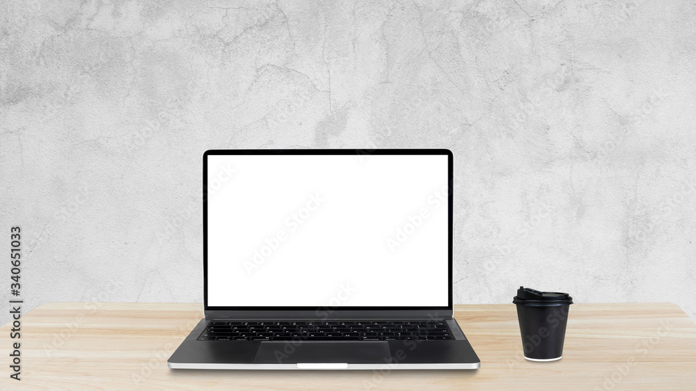 Workspace and Laptop computer on wooden table., Concrete background. Workspace and Laptop computer on wooden table., Concrete background.