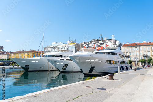 Big yachts are parked in port of Rijeka in Croatia. June 2019