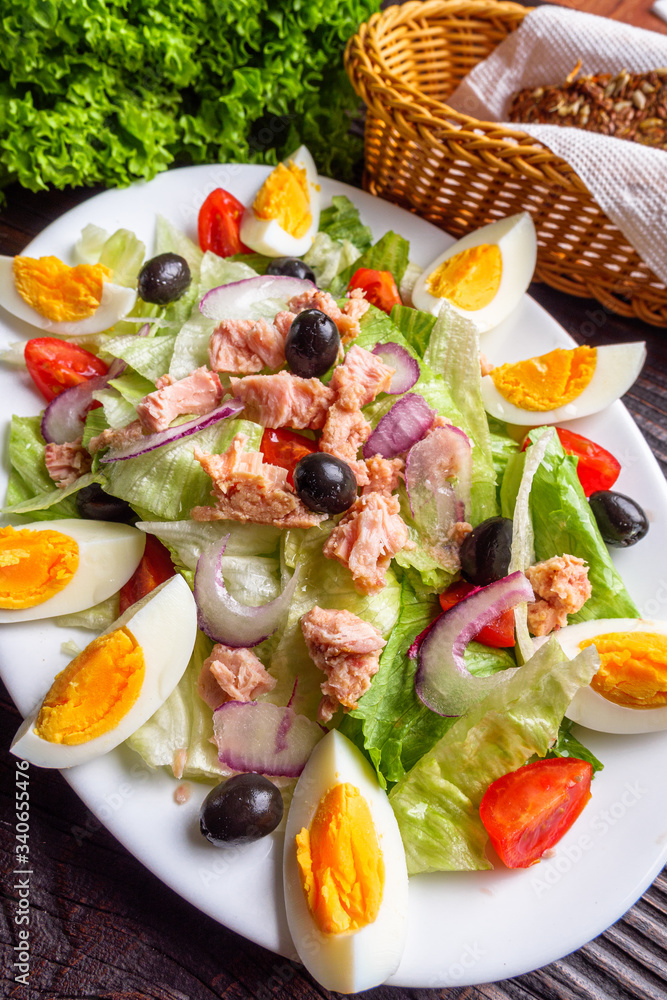 tuna salad on dark wooden rustic background tuna salad on dark wooden rustic background