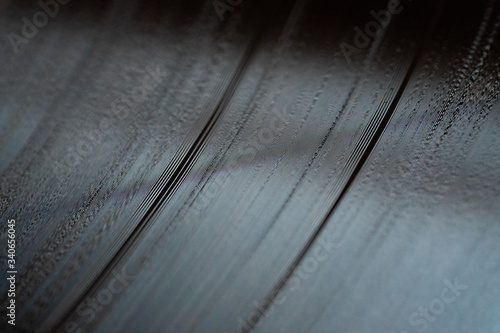 Close-up of grooves on vinyl record.