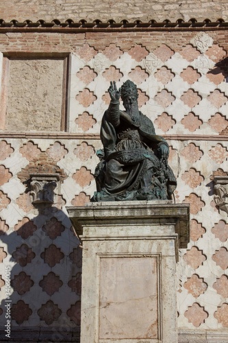 bronze statue of Pope Julius III in front os S.Lawrence Cathedral in Perugia, Italy photo