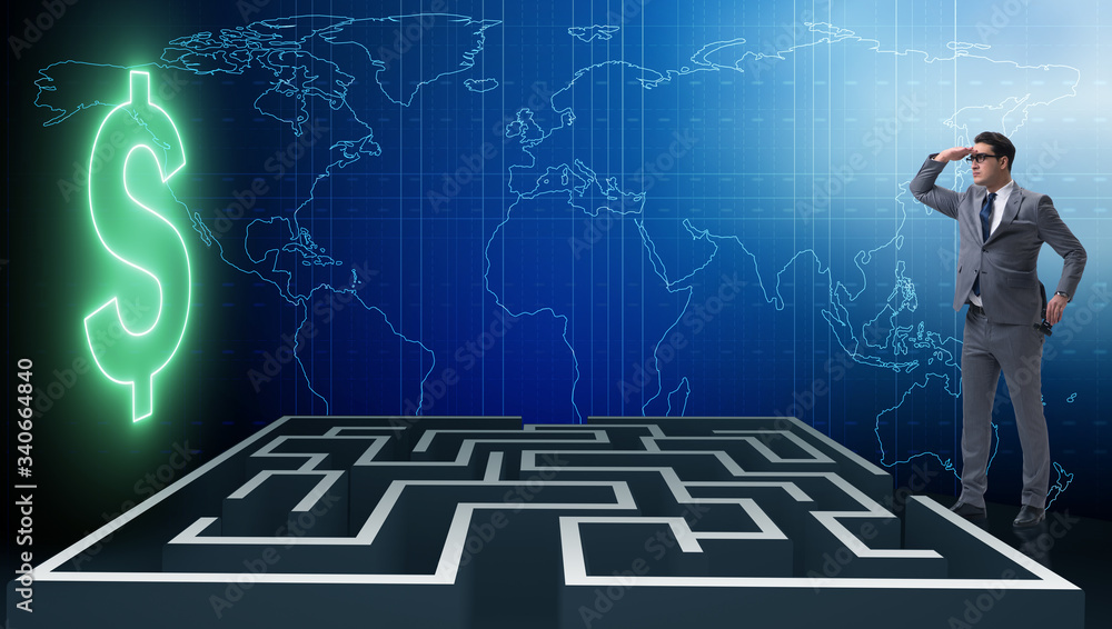 Man trying to reach dollars through maze