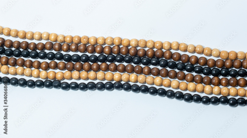 Wood rosary on white background. Wood rosary on white background.