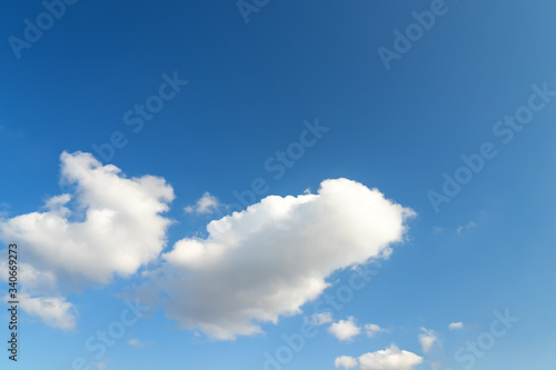 Large white clouds on a blue sky. Clear day. Background  blank for designers.