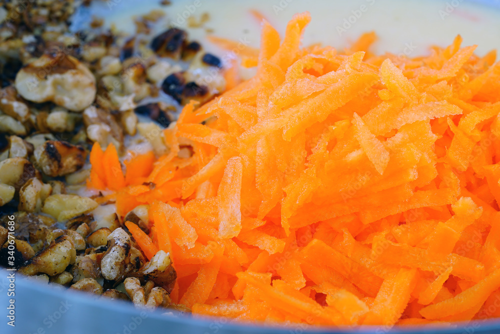 Making the batter for a vegan carrot cake in a bowl Making the batter for a vegan carrot cake in a bowl