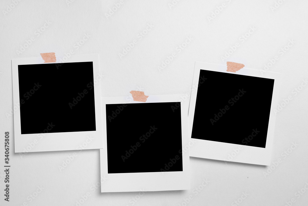 Polaroid photo frames. Square frame template with shadows isolated on transparent background.white sheet on clothesline with clothespin Polaroid photo frames. Square frame template with shadows isolated on transparent background.white sheet on clothesline with clothespin
