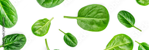 Spinach Pattern. Creative layout made of spinach leaves isolated on white background. Flat lay. Healthy Food concept. © nataliazakharova