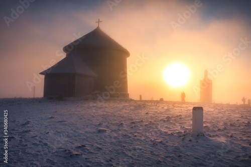 First snow in November in Karkonosze Mountains- sunrise in Sniezka peak the highest mountain in Sudety range.