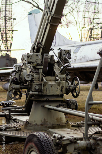 old rusty Russian anti-aircraft gun in the museum outside