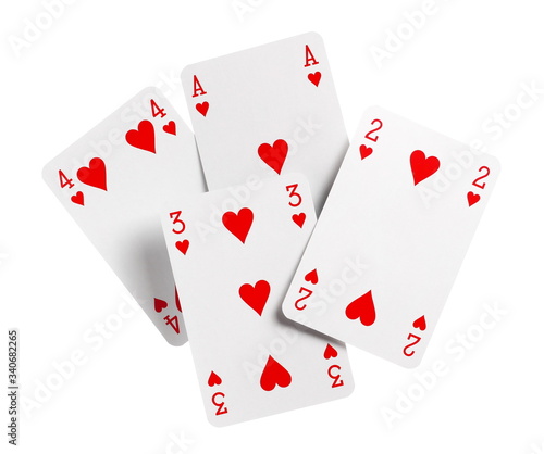 Playing cards for poker, gambling and casinos, red hearts isolated on white background with clipping path
