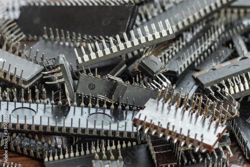 Close up of obsolete used microchips. Close up of electrical waste.