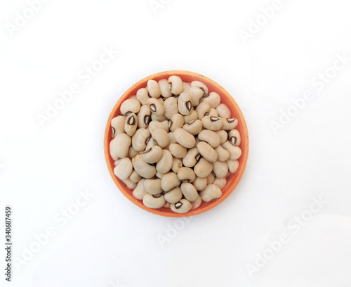 Black eyed beans in white isolated background. It is a subspecies of the cowpea, grown around the world for its medium-sized, edible bean. Scientific name - Vigna unguiculata photo