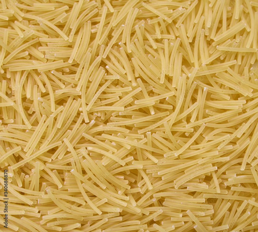 Close up photo of raw durum wheat pasta, filini vermicelles Close up photo of raw durum wheat pasta, filini vermicelles