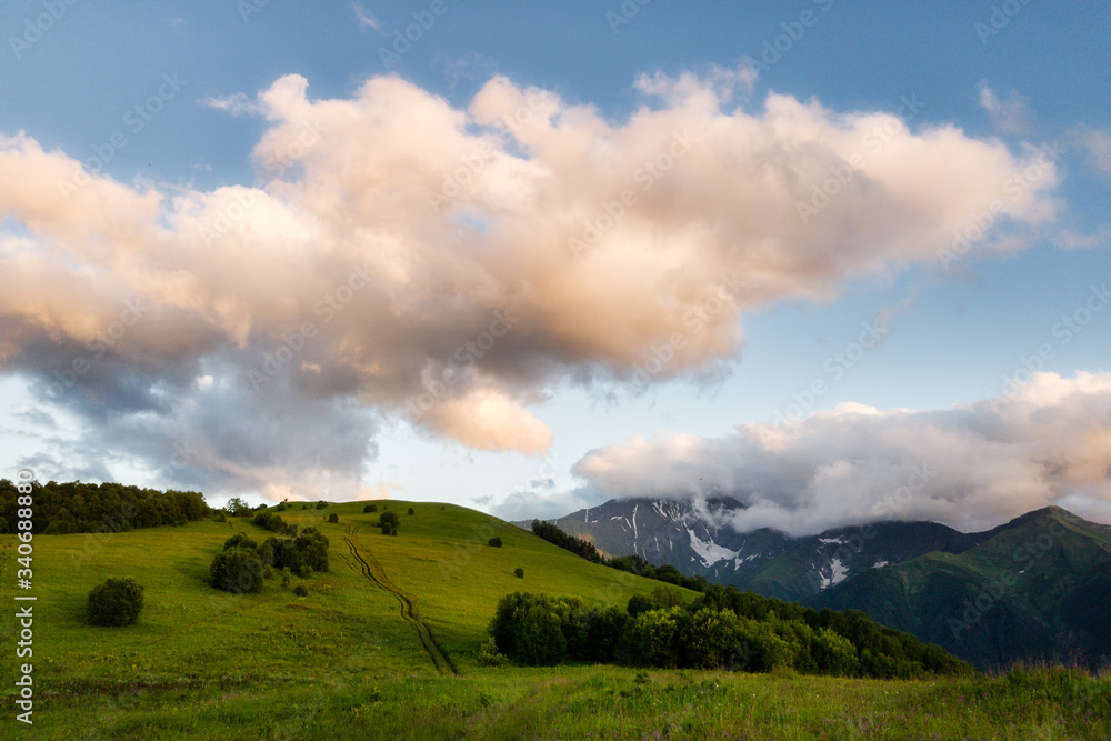 Mountain valley during bright sunrise. Beautiful natural landscape. Adygea