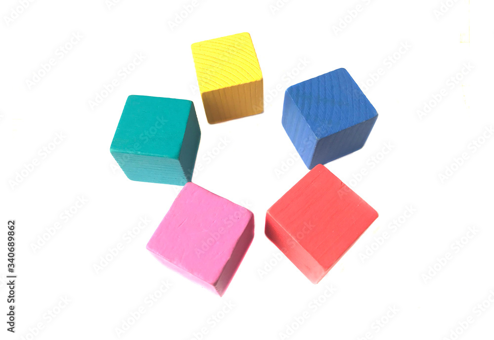 Fototapeta premium colored toy cubes in a circle on isolate