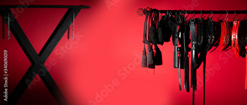 erotic games and human sexuality concept. kinky sex toys for  BDSM fantasy play (ball gag, cuffs, rope, flogger, collar and leash)