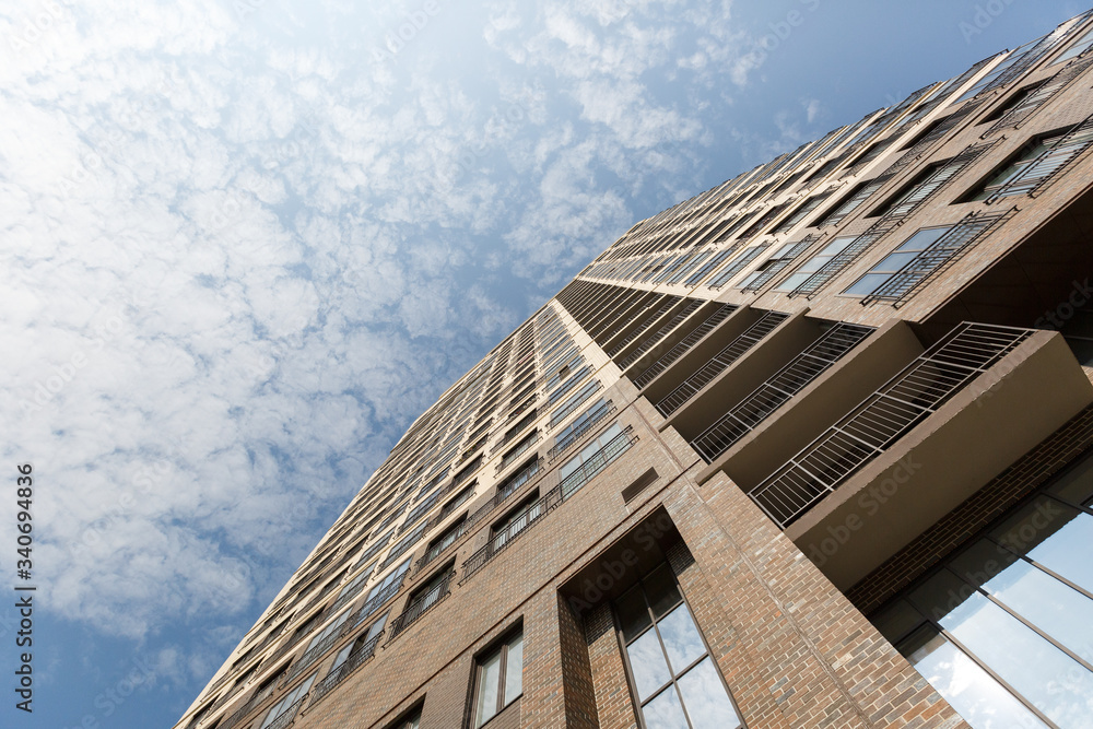 facade of a multistory building from bottom to top facade of a multistory building from bottom to top