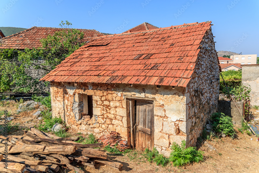 MOSTAR, BOSNIA HERZEGOVINA - 2017 AUGUST 16. Old brick house ruin. MOSTAR, BOSNIA HERZEGOVINA - 2017 AUGUST 16. Old brick house ruin.