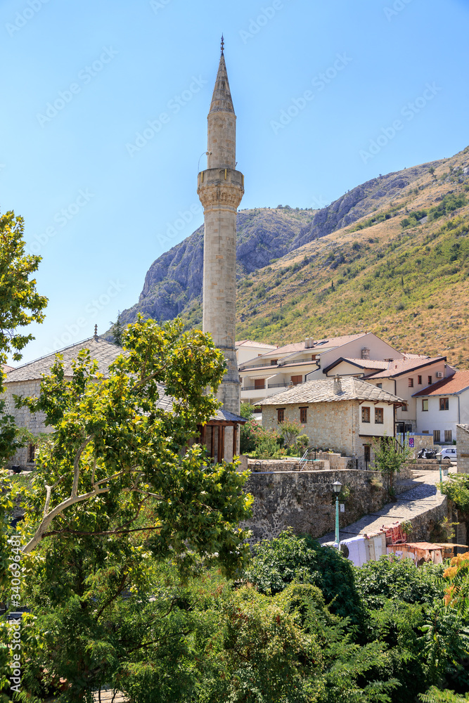 MOSTAR, BOSNIA HERZEGOVINA - 2017 AUGUST 16. The Haji Kurt mosque is located in Priecka bazaar, a hundred meters west of the Old Bridge in Mostar.