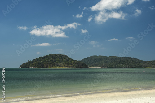 Relaxing holiday on beautiful Tropical sandy beach. Pantai Cenang, Langkawi Island, Andaman Sea, Malaysia