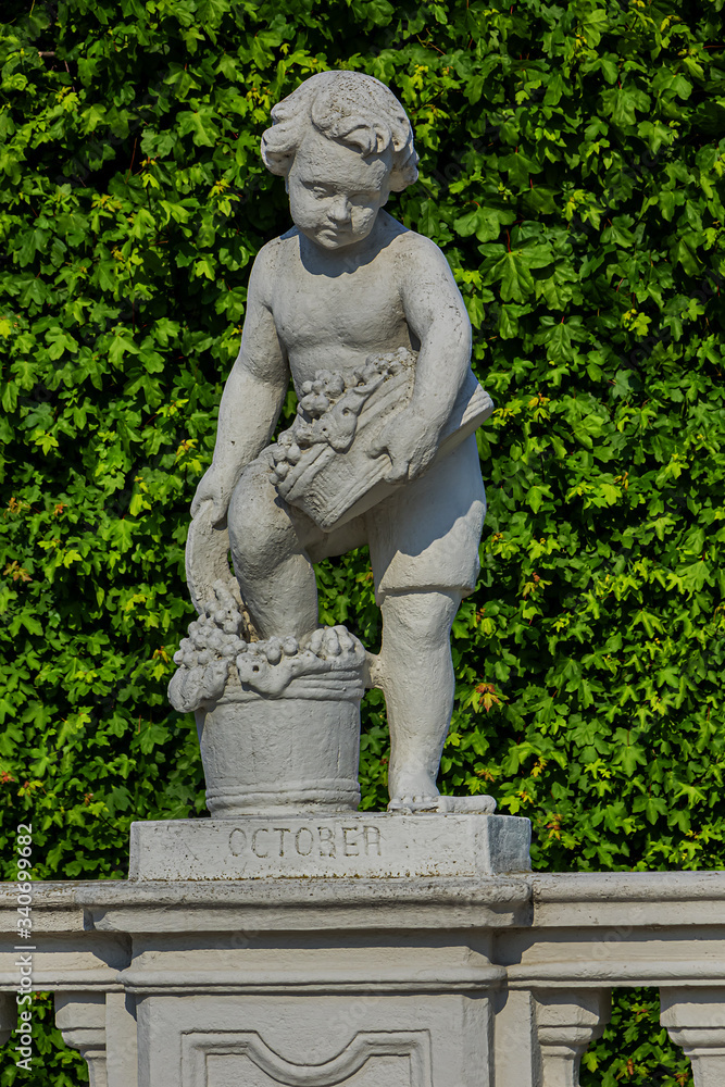 Sculptures in the public garden of Belvedere. Belvedere Palace was summer residence for Prince Eugene of Savoy. Vienna, Austria.