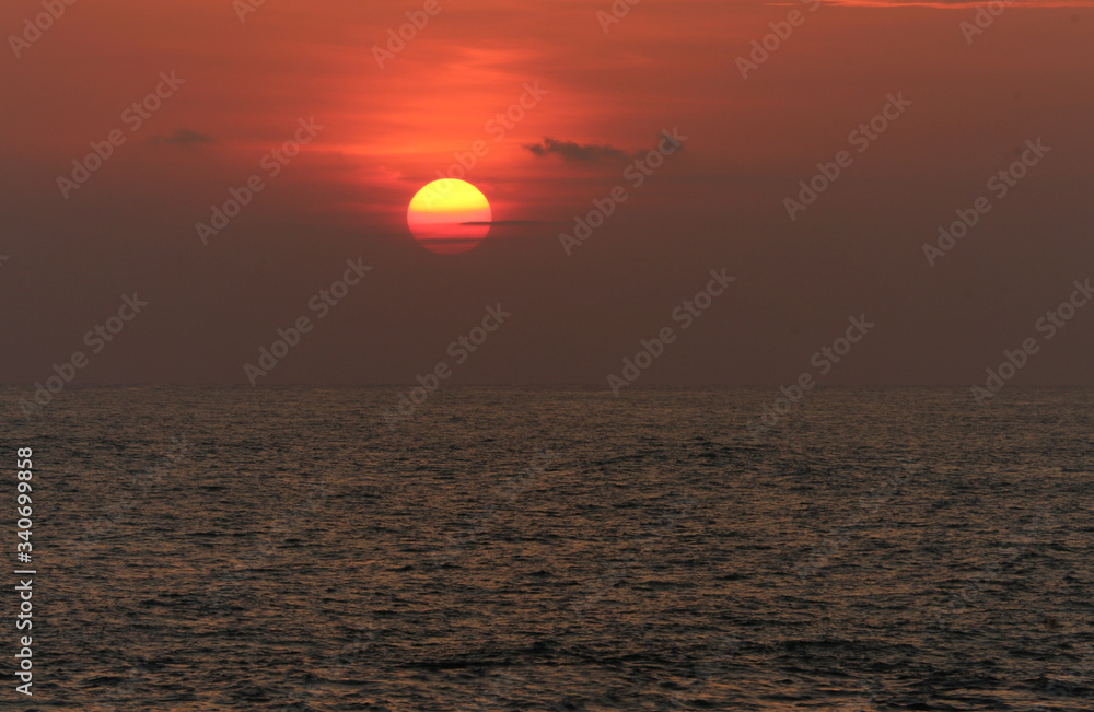 A Beach view Landscape of a Sun set Photograph at Golden hour