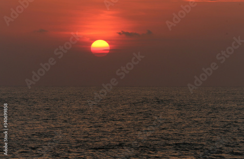 A Beach view Landscape of a Sun set Photograph at Golden hour © Ayaal