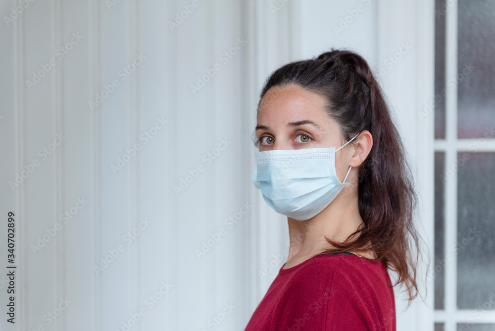 woman wearing a protective face mask woman wearing a protective face mask